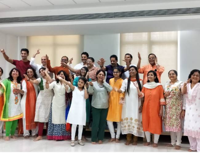 AMA event group photo with students and teachers
